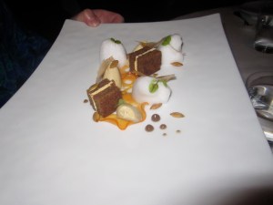 Jamaican GingerbreadMuscovado Custard, Confit Persimmon, Citrus Buttercream, and "Pepitas"