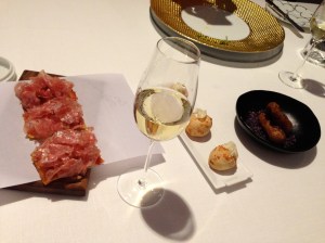 "The Origins": Tomato bread anfd "salchichón" from Vic; Farmhouse milk bread; Fried sardine.