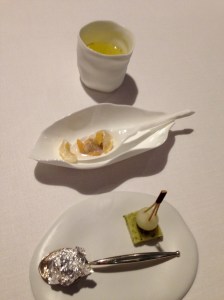 "The Previous": White garlic soup with mussels, and "torreznos"; Aromatic water; Seaweed cake with black sausage and melon; "Ferrero de foie".